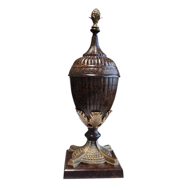 Beautiful vintage lacquered brass pedestal urn in excellent condition. Neoclassical style throwback to Georgian influence,...