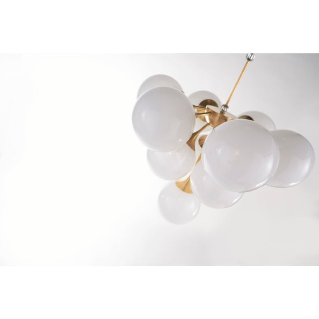 Metal AERIN for Visual Comfort Signature Cristol Tiered Chandelier in Hand-Rubbed Antique Brass with White Strie Glass For Sale - Image 7 of 11