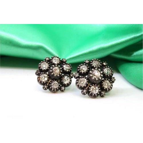 Gold and silver earrings with (7) rose cut diamonds and chips. Metal: Gold and Silver. Origin: European. Mark: Absent....