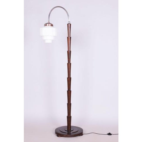 This floor lamp in Cubist style from the Art Deco period originates from Czechoslovakia in the early 20th century. It is...