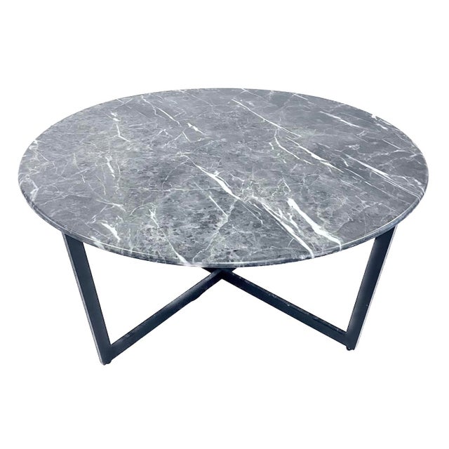 Vintage round faux marble and steel coffee table. Top is a dense material with realistic marble composition and appearance...