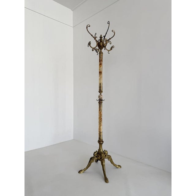 This impressive vintage Italian hall tree is a striking combination of sculptural design, luxurious materials and...