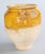A superb antique 19th century French confit pot with mustard yellow glaze from the South of France, Castelnaudary. This...