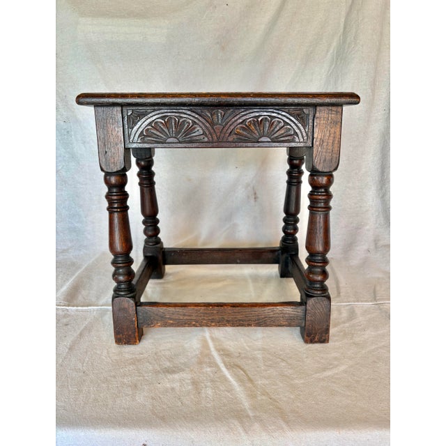 This 18th Century English Oak Joint Stool dates back to the 1700's. The piece is crafted with pegged mortise and tenon...