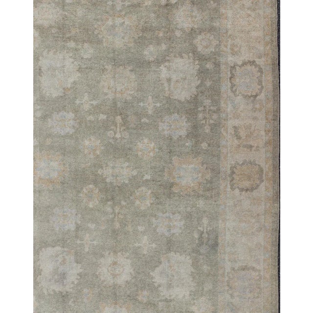 Large Turkish Oushak Rug with Large-Scale All-Over Blossom Design in Taupe, Pale Moss Green, light brown and Cream....