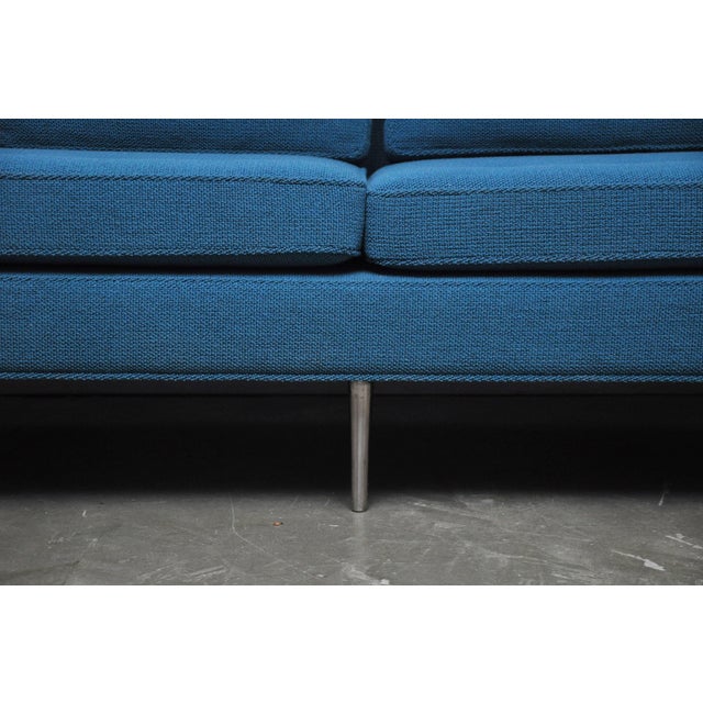 Iconic sofa designed by Edward Wormley for Dunbar. Fully restored. Polished nickel legs with new Knoll Aegean/turquoise...
