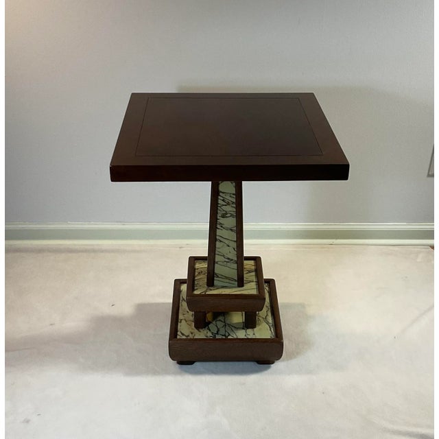 This is a unique marbleized walnut end table from the late 50's early 60's. This table features step levels of marbleized...