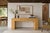 This striking vintage console table showcases a bold architectural presence, defined by its clean waterfall silhouette and...