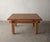This beautiful rustic European Oak coffee table features a plank-style top and and traditional pegged mortise-and-tenon...