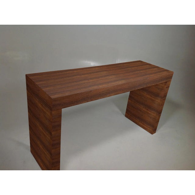 Mid century style solid walnut console . The rich walnut used to make this console is stunning. The console has clean...