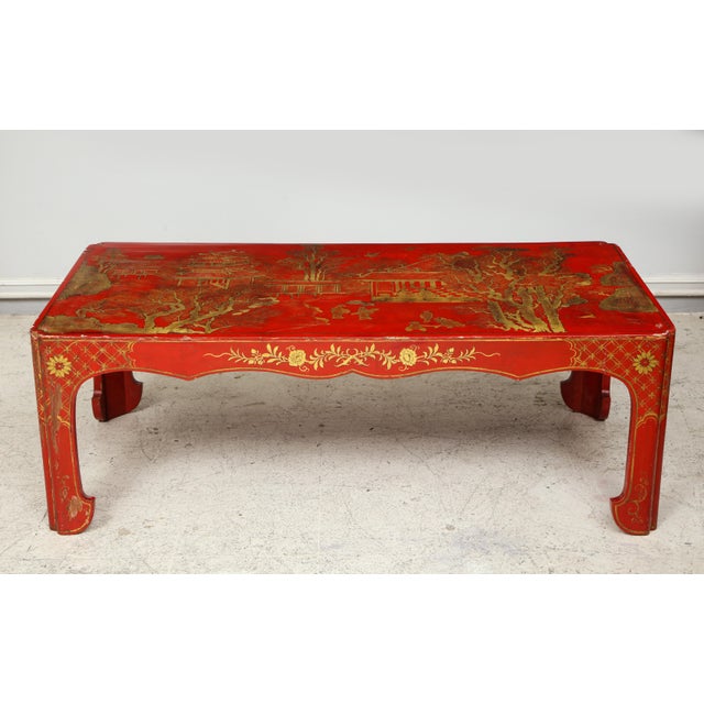 Vintage hand painted red lacquered Chinoiserie cocktail/coffee table.