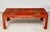 Vintage hand painted red lacquered Chinoiserie cocktail/coffee table.