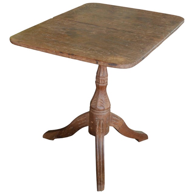 Andrianna Shamaris teak colonial hand-carved side table. This side table was sourced in the spirit of wabi-sabi, a...