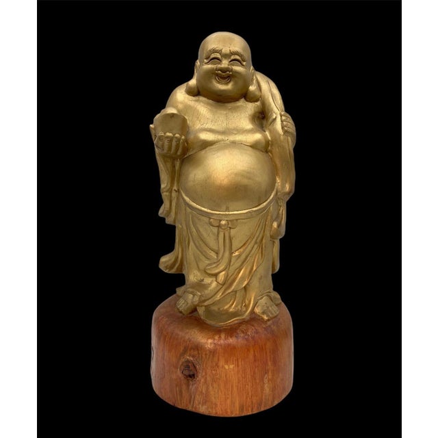 Dimensions: height 55 cm, base diameter 24 cm. An impressive Japanese wooden sculpture of Hotei, one of Japan’s Seven...