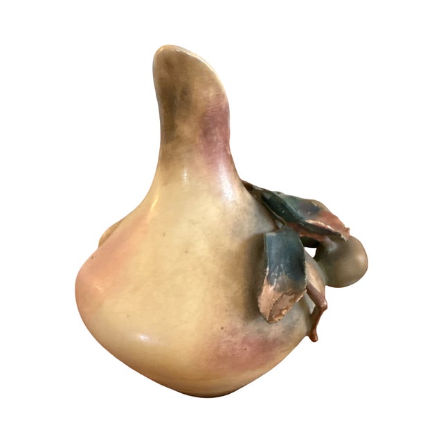 A beautifully modeled antique Amphora vase produced by RStK (Reissner, Stellmacher & Kessel) and dating to approximately...