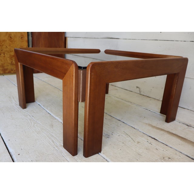 Iconic smoking table in walnut with smoked glass top in the unmistakable design by Afra & Tobia Scarpa. Like the other...