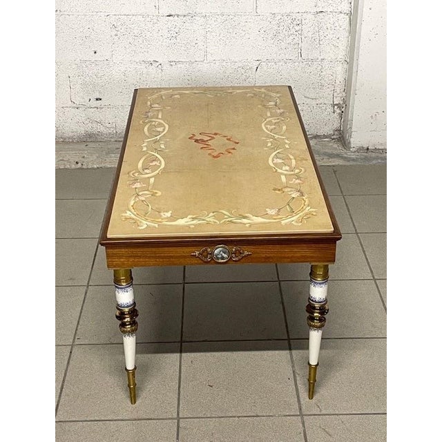 1950s sofa or coffee table of great quality and Italian manufacturing. The coffee table features the following...