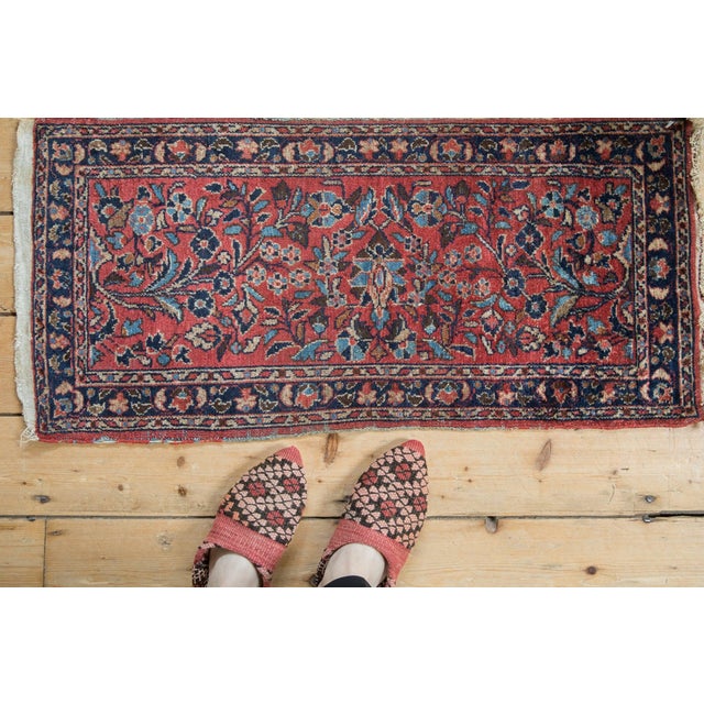 :: Unusual size and scale with center floral medallion in landscape orientation and end floral vines inwardly directed in...