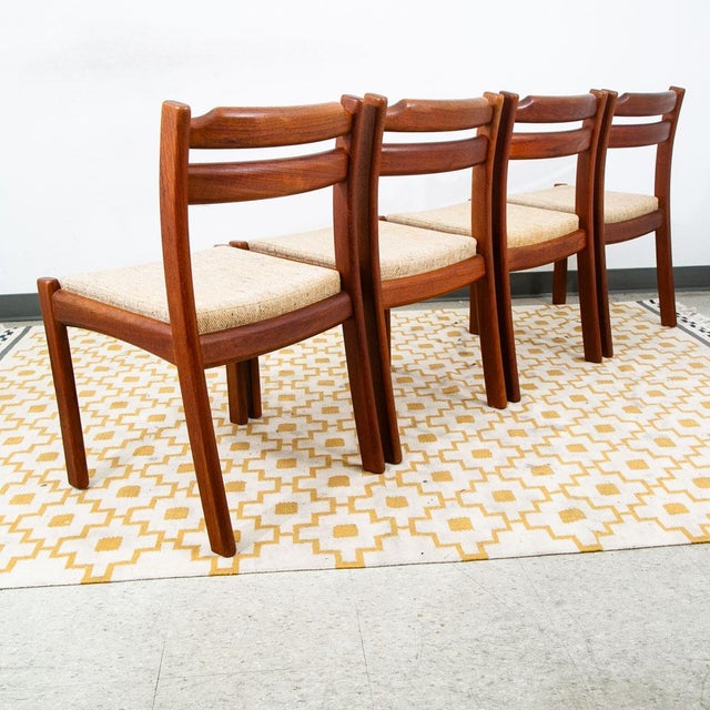 Dyrlund Teak Dining Chairs, Denmark 1965. This set comes in solid sculpted thick teak and was recently and is offered in...