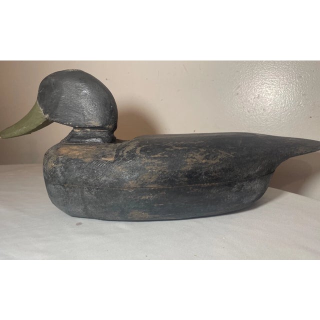 Up for sale is a wonderful antique hand carved wooden black duck decoy sculpture made in Tuckerton 1969. It's beautifully...