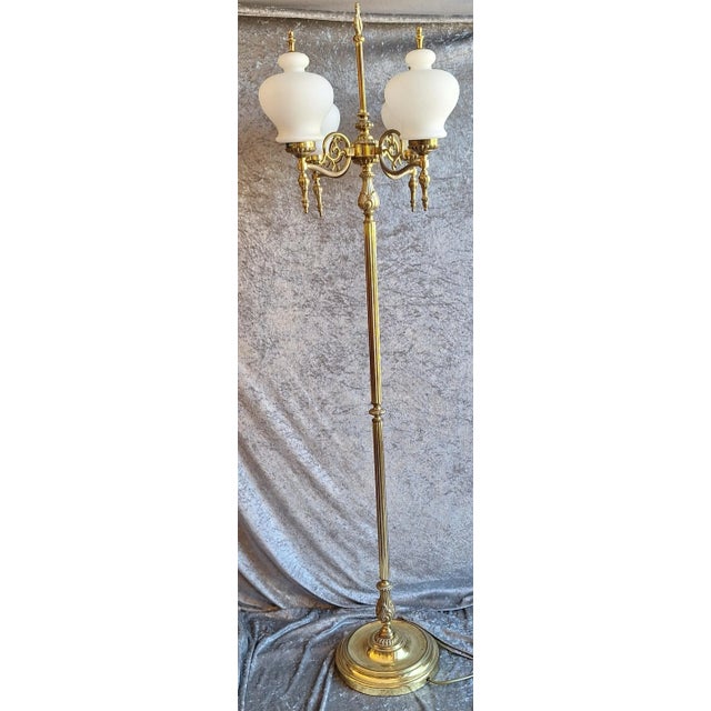 Vintage Floor Lamp with Decorated Brass Frame and Four Opaque White Glass Shades, 1970s, in Very Good conditions. Designed...