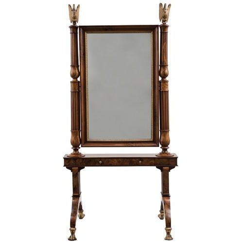 Empire style mirror is a precious decorative object realized in Emilia (Italy) in the first fourth of the 19th century....