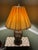 This striking mid-century Japanese Satsuma-style porcelain temple jar has been beautifully converted into a substantial...