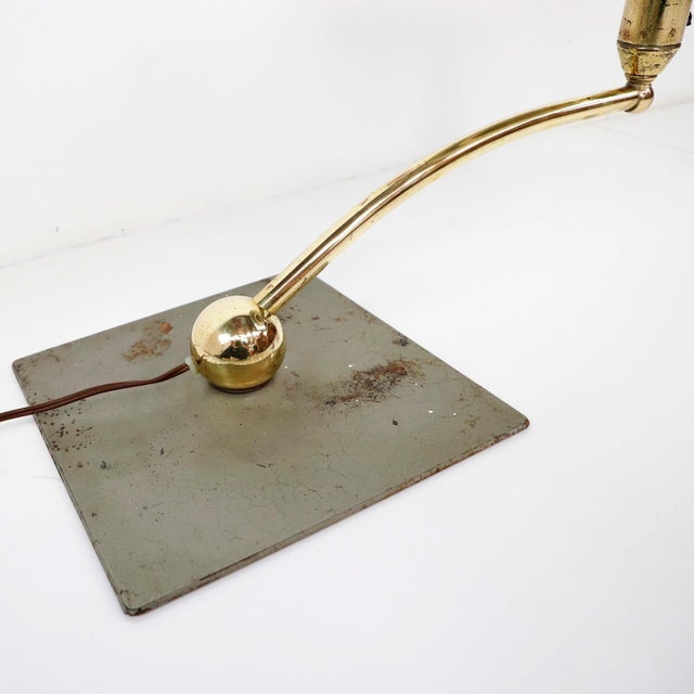 circa 1930s. We offer this Art Deco Modern sight light table lamp. Brass with copper baked brown enamel shade and base....