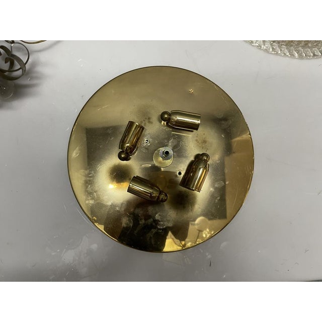 Murano Glass Flushmounts set of 2 1980’s Handblown Murano glass with a ribbed edge Glass has golden hues Brass backplate...