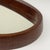 Mid-century wall mirror with Teak made in Italy in the 1960s. The vintage mirror is in very good vintage condition. The...