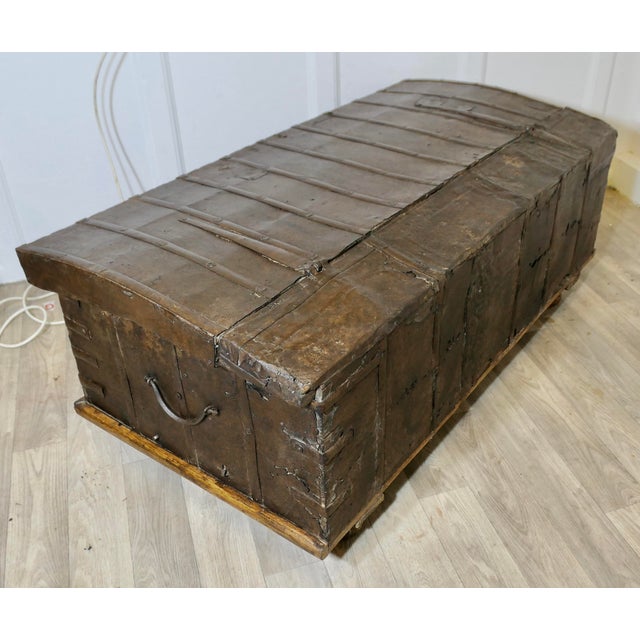 Decorative Spanish Metal Dome Top Trunk The trunk has a pine carcass and it is covered in iron panels, it has wooden...