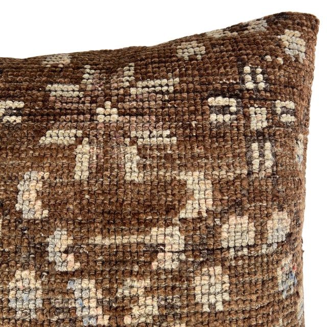 Crafted from an authentic vintage Turkish rug, this one-of-a-kind pillow brings warmth, texture, and a sense of history to...
