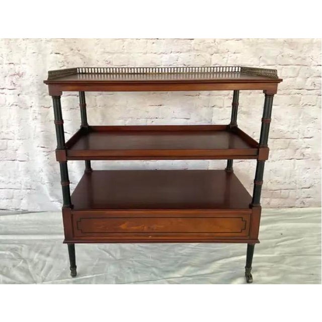 Beacon Hill Collection Three-Tiered Mahogany Etagere/Side Table. Table is accented with an elegant pierced brass gallery...