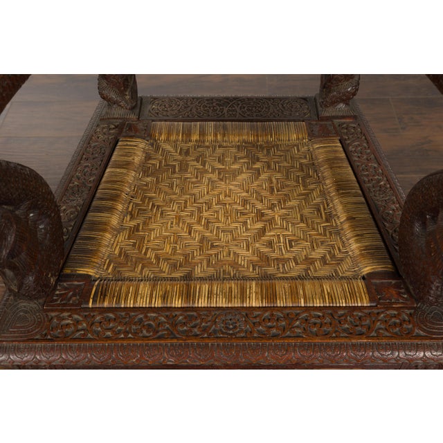 Anglo-Indian 1900 Armchair with Carved Back, Mythical Creatures and Woven Rattan For Sale - Image 11 of 12