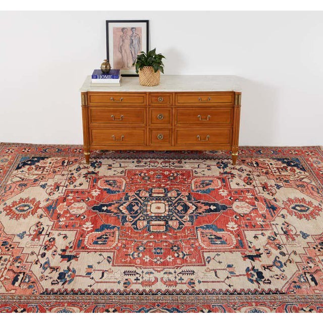 Exceptional vintage 21st century Persian Heriz carpet. Stylized floral geometric patterns over a light beige field. Lovely...