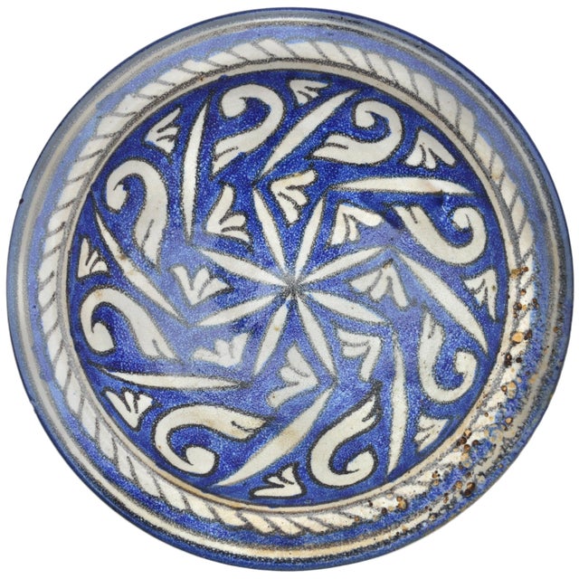 One-of-a-kind antique handcrafted and glazed Moroccan ceramic plate from Fez. Featuring an elaborate hand-painted fine...