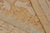 This 12x15 rug from the Modern Classics Collection features a gold field, blue and beige-brown borders underscore...