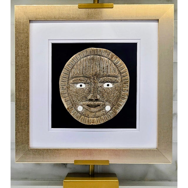 Celebrate authentic Alaska Native art with this powerful whale bone “Sun Face” carving by John “Boy” Weyiouanna, an...