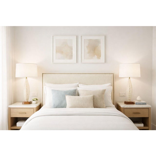 An elegant pair of original Murano glass table lamps crafted in Italy during the 1960s. These sculptural lamps feature...