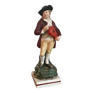 Antique Early 19th Century English George III Staffordshire Pearlware Figure of a Musician Playing the Hurdy-Gurdy 1800