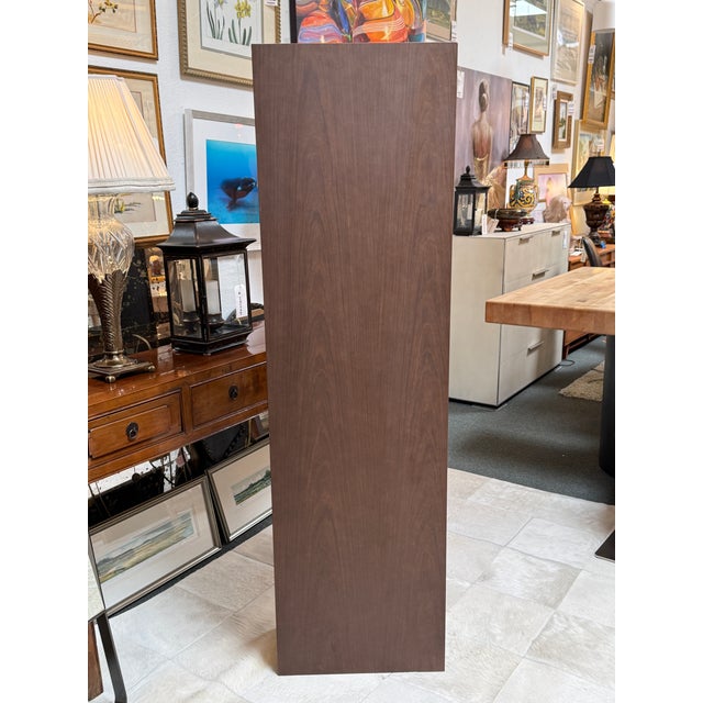 Design Plus Gallery presents an American Walnut L-Cube Cabinet by Christian Werner for Duravit. The cabinet is an...