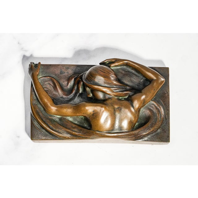 A striking example of Viennese Art Nouveau artistry, this exceptional antique bronze paperweight was produced by the...