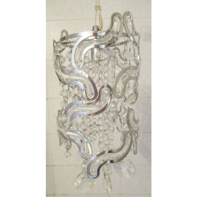Pair of ET2 Twist 1-Light Pendants in Polished Chrome E21253-20PC Brand Information Brand: ET2 Collection: Twist...