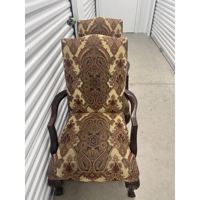 Description: Beautiful, matching pair of vintage Queen Anne-style upholstered armchairs. These statement pieces feature...