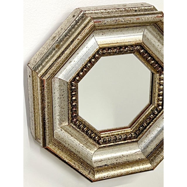 Mini vintage hexagonal Italian molding mirror. Makes a great accent on a wall or in a bookcase. 7" x 7" x 1.75" d