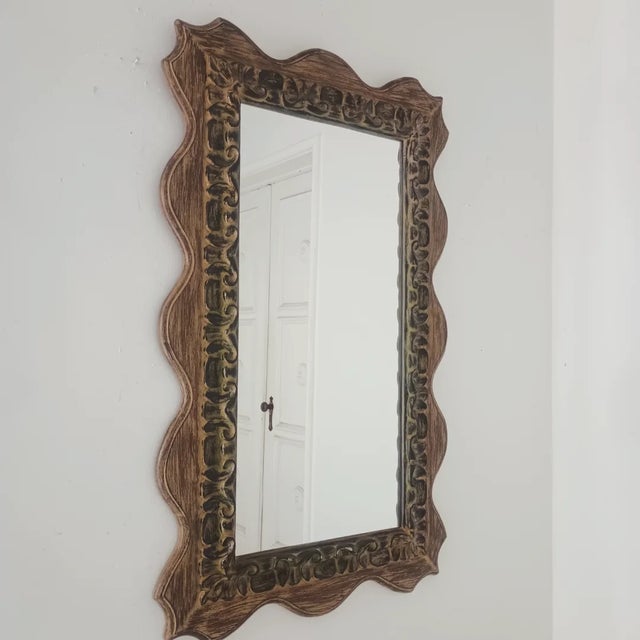 This amazing, rare wall mirror is from the 50s - 60s. It is all hand built with wood, plaster coat over and a beautiful...