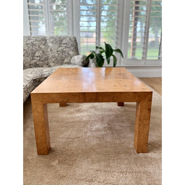 Classic olive burlwood Parsons-style cocktail table, c.1970s. The perfect square with a taller profile, this table could...