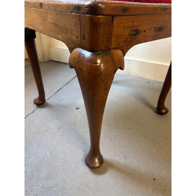 An 18th century Queen Anne Walnut Corner Chair, England, circa 1740, the horseshoe-shaped crest rail above three turned...