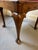 An 18th century Queen Anne Walnut Corner Chair, England, circa 1740, the horseshoe-shaped crest rail above three turned...