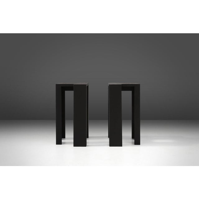 Belgium / 2017 / Bram Vanderbeke / 12 stools / pine plywood / modern These sleek black stackable stools are designed by...